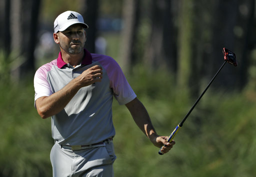 McIlroy reveals back injury