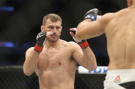 Stipe Miocic, Joanna Jedrzejczyk retain titles
