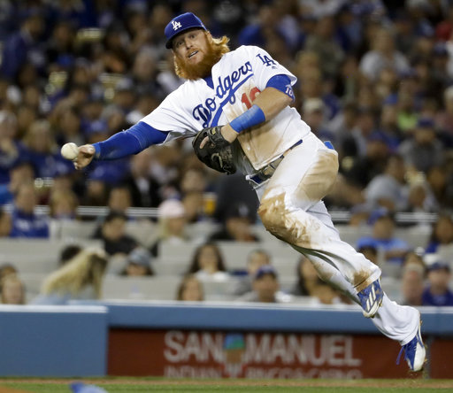 Turner injures right hamstring, Dodgers beat Marlins 7-2