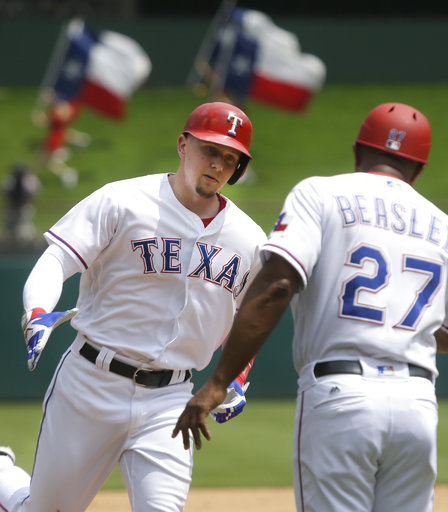 Rua homer extends Rangers' streak to 9