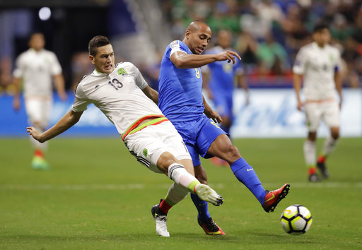 Mexico beats Curacao 2-0 to win CONCACAF Group C
