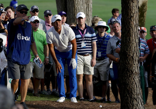 Jason Day makes moves, up and down, during Round 3 at PGA