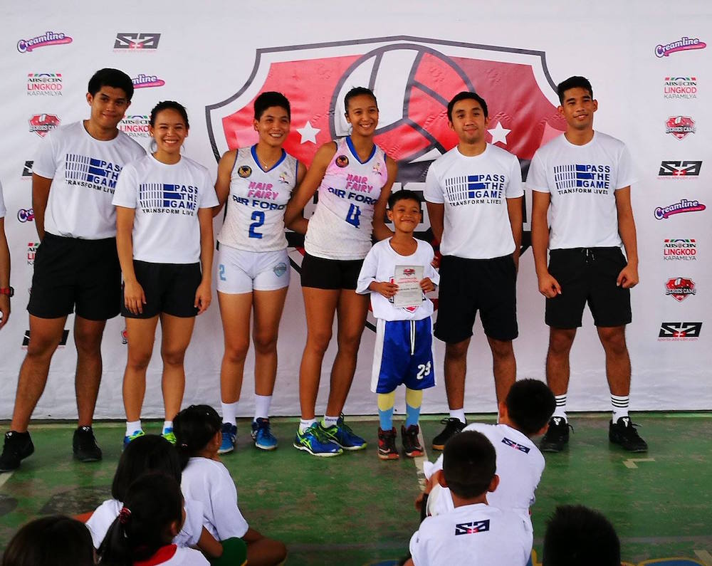Lady Jet Spikers Iari Yongco, Mickaela Andres give back